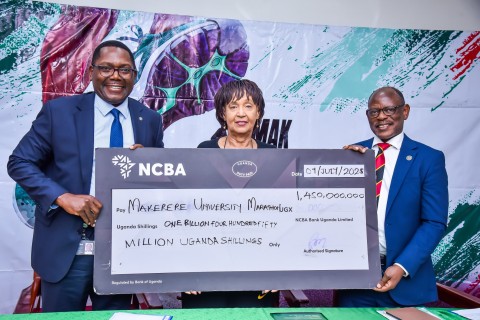 Left to Right: NCBA Bank CEO-Mr. Mark Muyobo, MakEF Board Chairperson-Dr. Maggie Kigozi and the Vice Chancellor-Prof. Barnabas Nawangwe hold the dummy cheque unveiling the UGX 1.45 billion sponsorship for the Makerere Marathon for the next five years. Makerere University Endowment Fund (MakEF)’s flagship initiative – the Makerere University Marathon unveiling of NCBA Bank Uganda as Platinum Sponsor with UGX 1.45 Billion over five years, 9th July 2025, Kampala, East Africa.