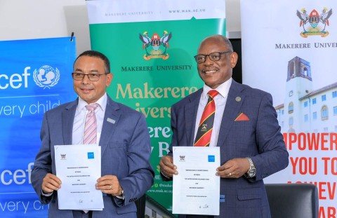 The Vice Chancellor Professor Barnabas Nawangwe (Right) and UNICEF Uganda Representative Dr. Robin Nandy (Left) show off the signed MoU on 14th August 2025. Makerere University (Mak) and United Nations Children’s Fund (UNICEF) Uganda sign MoU that launches a two-year, renewable partnership aimed at advancing child rights and well-being through rigorous research, capacity building, and policy-driven innovation, CFC, MITER, CEES, MakSPH, 14th August 2025, Main Building, Kampala Uganda, East Africa.
